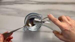Wasser Essig Schale Löffel